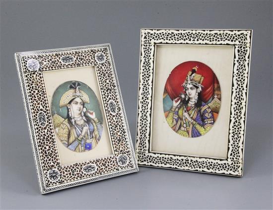 A near pair of late 19th century Indian gouache on ivory miniatures of Mughal consorts, largest 4.25 x 3.25in., in ivory mounted sanda
